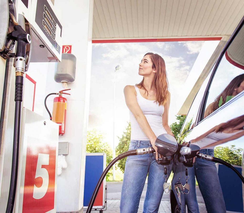 woman at petrol pump