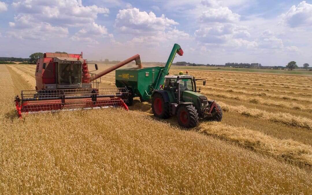 Tractor working in a field - Reducing Green Gas Emissions